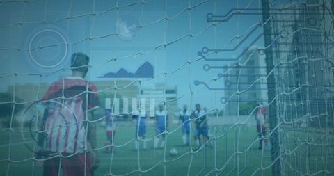 Digital overlay on soccer field with players during penalty kick
