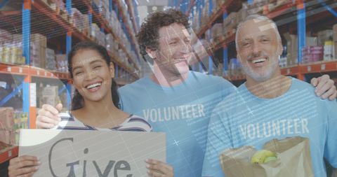 Smiling Volunteers Engaged in Warehouse Support Activity - Download Free Stock Images Pikwizard.com
