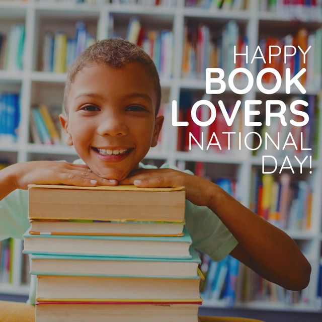 Merry book lovers national day text against caucasian boy with stack of books smiling at library. Book lovers national day awareness concept