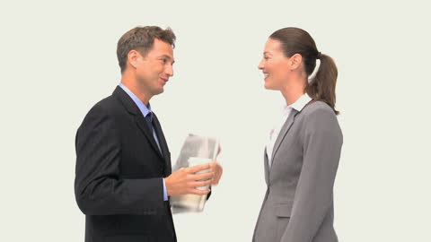Smiling Coworkers Sharing Laughter During Informal Conversation
