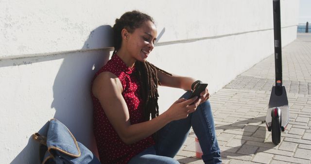 Young Woman Relaxing Outdoors Using Smartphone - Download Free Stock Images Pikwizard.com