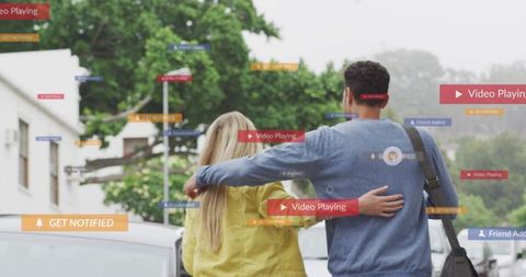 Young Couple Enveloped in Social Media Connectivity