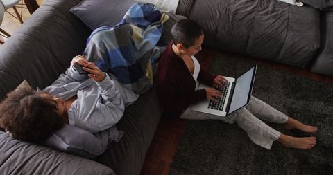 Diverse LGBTQ Couple Engaging with Technology at Home - Download Free Stock Images Pikwizard.com