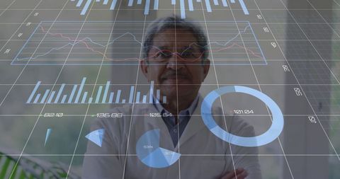 Senior scientist analyzing holographic charts in modern office