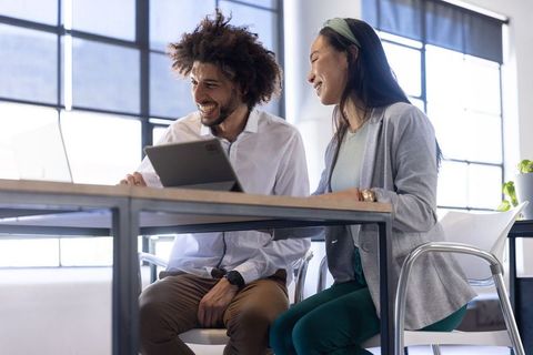Innovative middle eastern colleagues collaborating in modern office