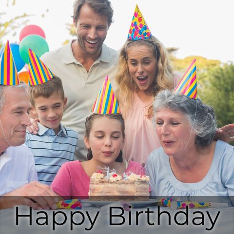 Multigenerational Family Celebrating Birthday Outdoors