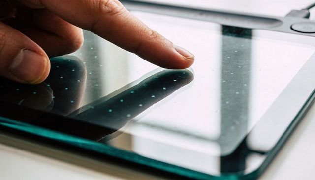 Fingertip Pressing Glass Tablet with Dotted Touch Grid and Reflective Display