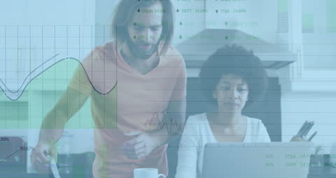 Diverse Couple Analyzing Finances with Digital Data Overlay