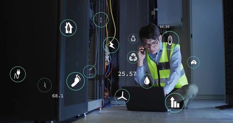 Technician using technology in server room with sustainability icons
