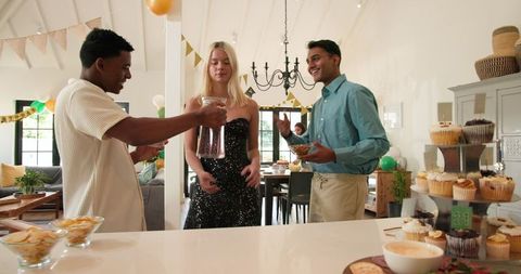 Friends Preparing for a Festive Birthday Celebration at Home