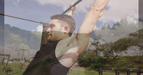 Athlete Performing Pull-Ups on Outdoor Equipment with Nature Background