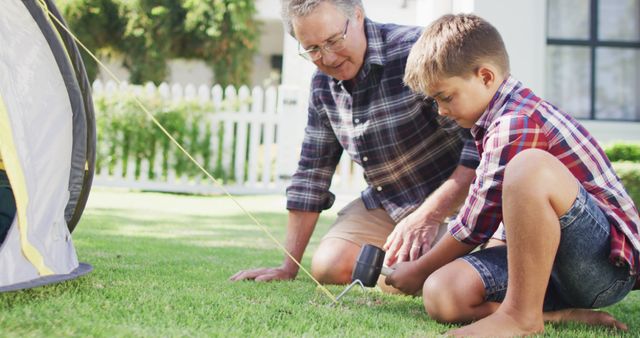 Grandfather Helping Grandson Set Up Tent in Backyard - Download Free Stock Images Pikwizard.com