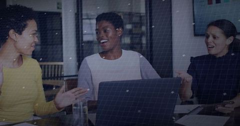 Engaged Businesswomen in Active Office Brainstorming Meeting