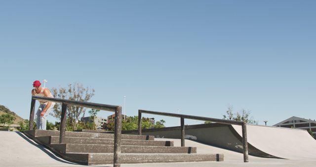 Young man practicing skateboarding tricks on urban skatepark stairs - Download Free Stock Images Pikwizard.com