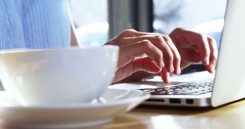 Woman Typing on Laptop in Coffee Shop - Download Free Stock Images Pikwizard.com