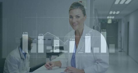 Smiling Doctor Analyzing Digital Charts in Hospital Setting