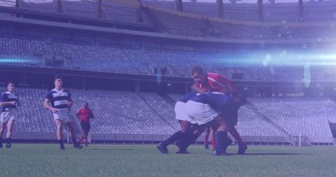 Diverse Rugby Team Competing Fiercely in Stadium Field