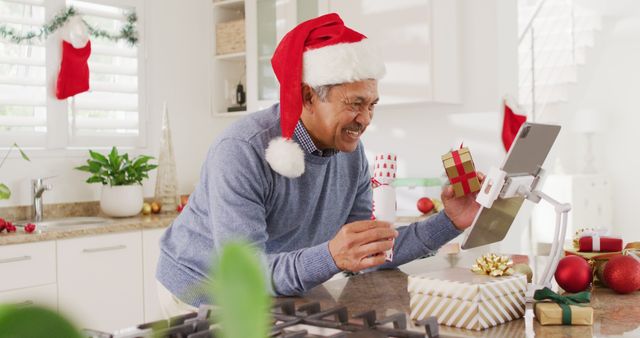 Senior Man Celebrating Virtual Christmas Gift Exchange with Family - Download Free Stock Images Pikwizard.com