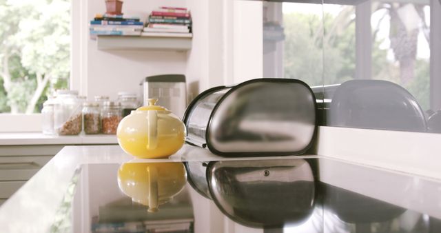 Modern Kitchen Corner with Yellow Teapot and Reflections - Download Free Stock Images Pikwizard.com