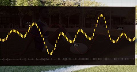 Translucent audio waveform overlay revealing seated athlete on campus lawn data visualization