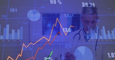 Doctor analyzing medical data with futuristic digital infographics in clinic