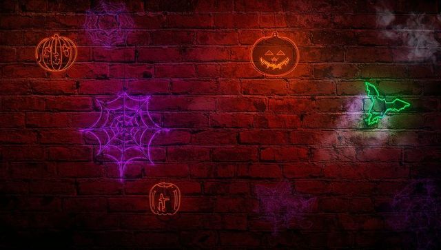 Vibrant halloween rgb neon decor on brick wall