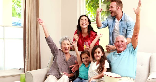 Multi-Generational Family Celebrating Together in Living Room - Download Free Stock Images Pikwizard.com