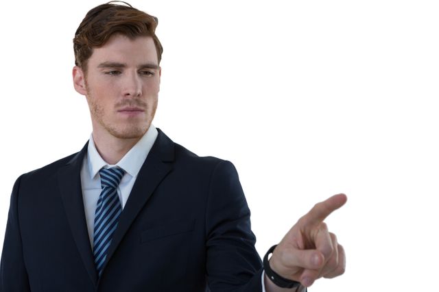 Businessman in a suit pointing at an invisible screen, suggesting use of modern technology and virtual interfaces. Ideal for illustrating concepts of innovation, technology in business, virtual reality, and professional settings. Suitable for websites, presentations, and marketing materials related to business and technology.