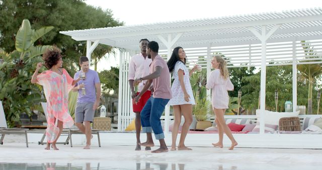 Diverse Friends Dancing at Outdoors Pool Party - Download Free Stock Images Pikwizard.com