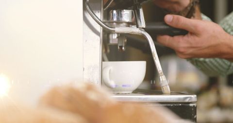 Barista Operating Coffee Machine With Energy Movement Effect