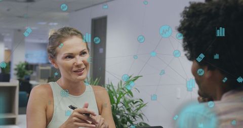 Diverse Team Collaborating with Digital Network Overlay in Modern Office