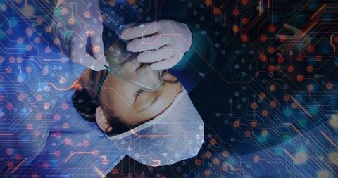 Nurse placing oxygen mask during anesthesia with digital circuit overlay