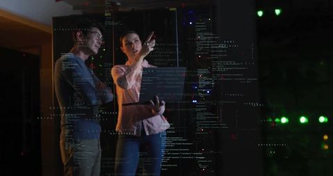 IT Team Collaborating in Data Center with Code Overlay and Server Monitoring