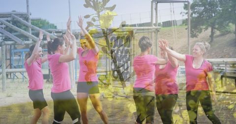 Diverse Women Celebrating Success at Obstacle Course with Plant Overlay - Download Free Stock Images Pikwizard.com