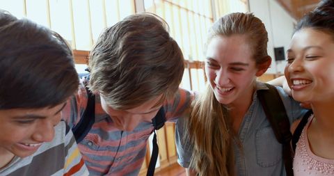 Teenagers Bonding in Joyful Friendship, Sharing Laughter