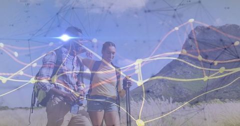 Adventurous Hikers with Data Overlay Exuding Connectivity and Discovery