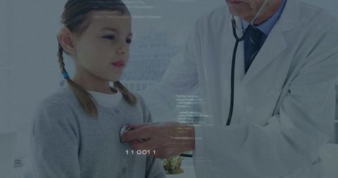 Doctor Using Stethoscope to Check Young Patient's Heartbeat