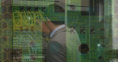 Technology Professional Working with Server Equipment and Circuits