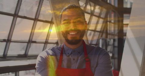 Cheerful Barista Overlaid with Serene Sunset Scene