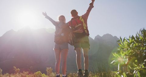 Happy Couple Embracing Adventure Hiking in Picturesque Mountains - Download Free Stock Images Pikwizard.com