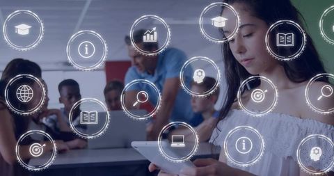 Teenage girl using tablet in collaborative classroom with digital learning icons overlay