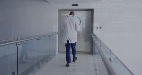 Doctor Walking Hospital Corridor in Lab Coat with Modern Interior