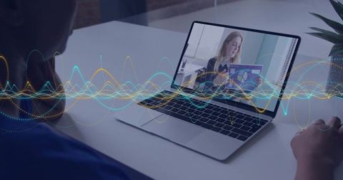 Presenter holding chart while viewer clicking laptop with waveform overlay for remote collaboration