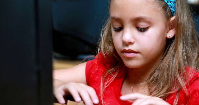 Young Girl Learning to Type on Computer - Download Free Stock Images Pikwizard.com