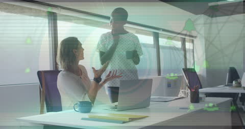 Colleagues Discussing Ideas in Modern Office Environment