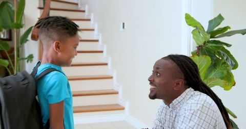 Joyful Father and Son Reunite After School