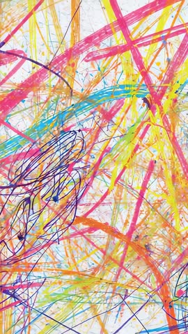 Vertical Neon Paint Splatter Video Showing Vibrant Dripping Scribbles and Energetic Motion