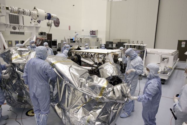 Technicians Preparing NASA Mars Science Laboratory Rover in Clean Room - Download Free Stock Images Pikwizard.com