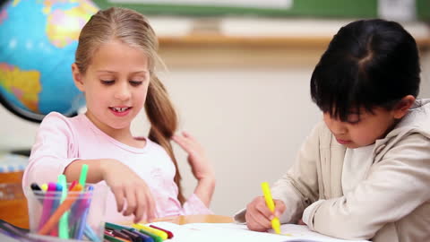 Children Engaged in Creative Activity in Classroom