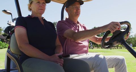 Senior Couple Driving Golf Cart on a Sunny Day - Download Free Stock Images Pikwizard.com